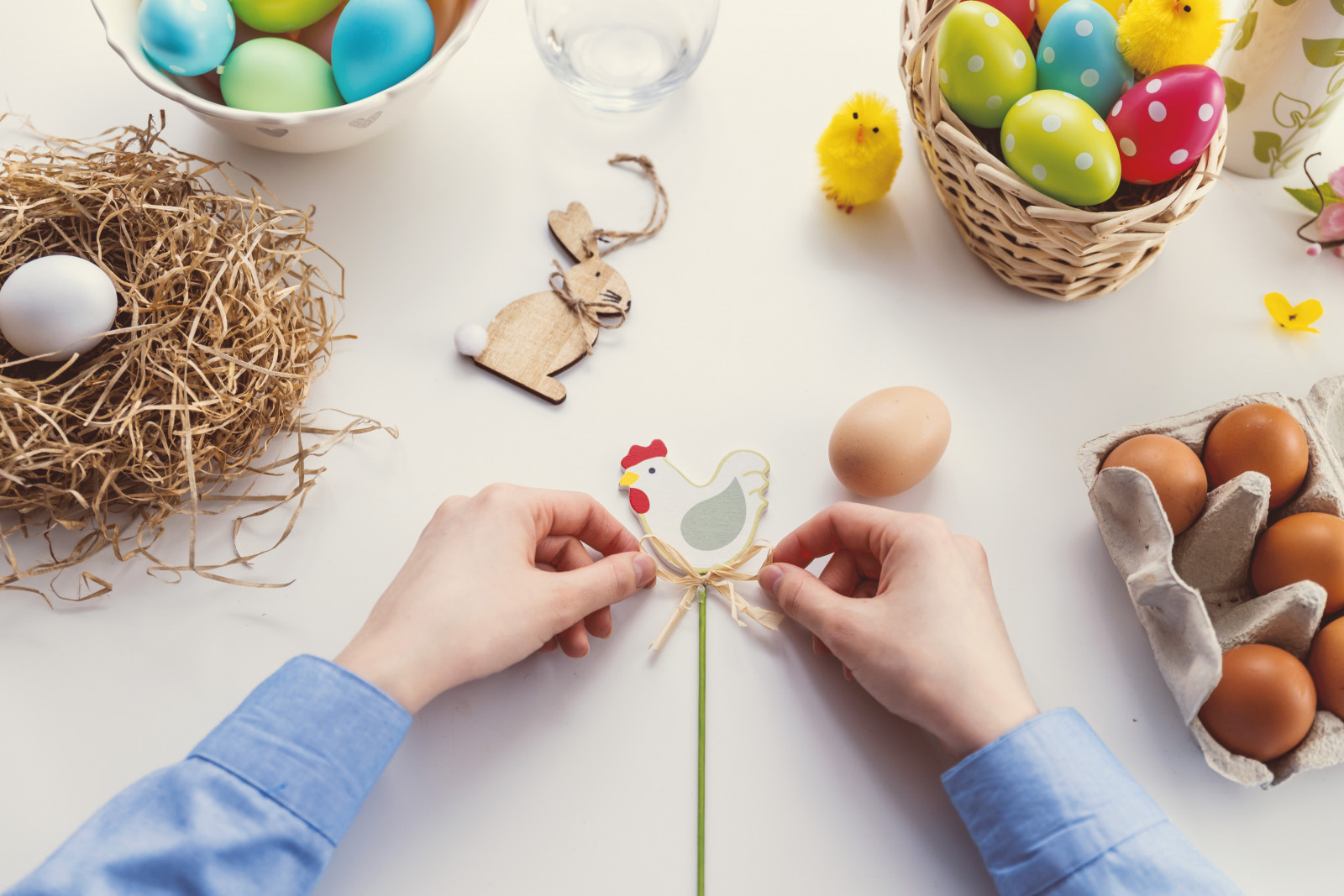 person tying knot on chicken decor 1040161