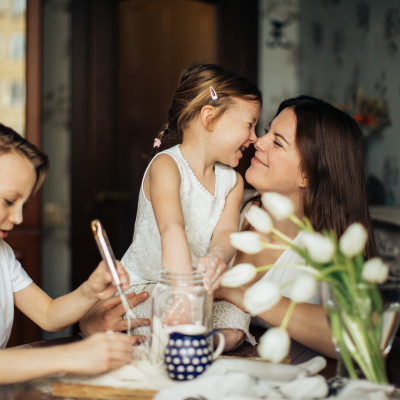 photo of woman playing with her children 3806953