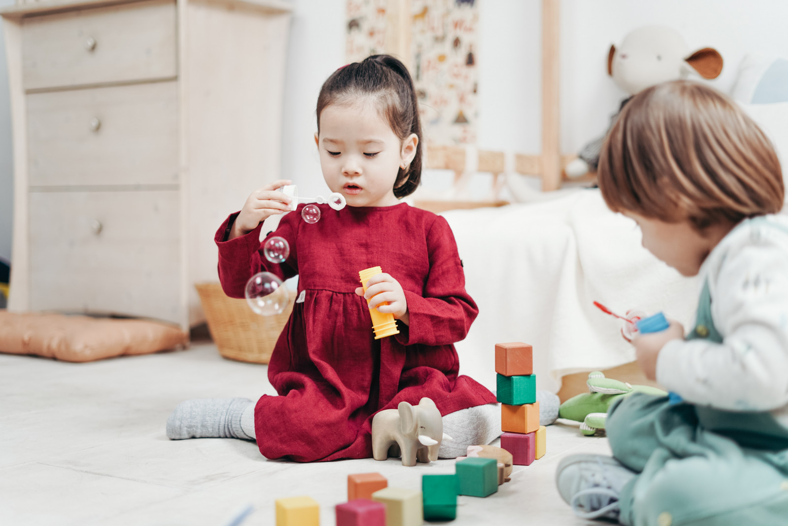 toddlers playing indoors 3661456